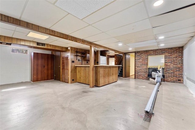 226 Ridgeview Dr, Columbia, IL 62236 - finished basement with stairway, brick wall, a drop ceiling, and recessed lighting