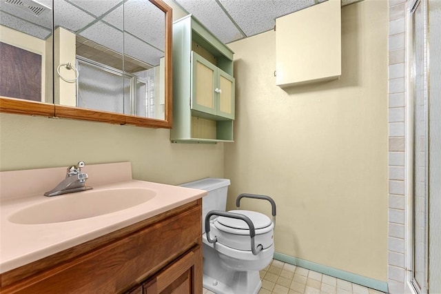 226 Ridgeview Dr, Columbia, IL 62236 - bathroom featuring toilet, a shower stall, vanity, baseboards, and a paneled ceiling
