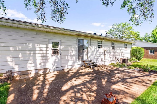 226 Ridgeview Dr, Columbia, IL 62236 - rear view of house with entry steps and a patio