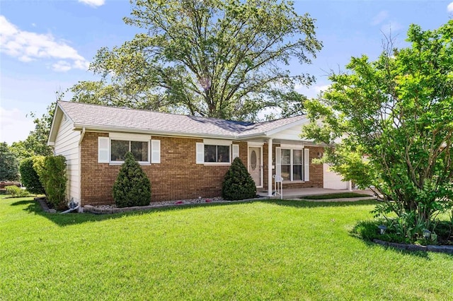 226 Ridgeview Dr, Columbia, IL 62236 - single story home featuring brick siding, a front lawn, and an attached garage