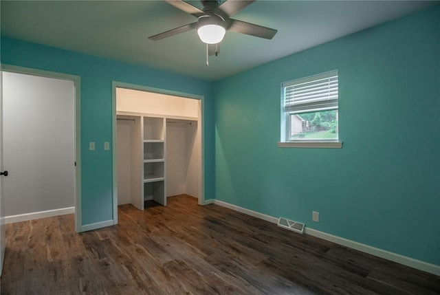 2137 Inman Rd, Poplar Bluff, MO 63901 - unfurnished bedroom with dark wood-style floors, baseboards, a closet, and ceiling fan