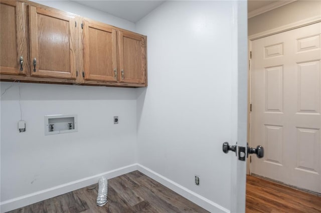 2137 Inman Rd, Poplar Bluff, MO 63901 - washroom with electric dryer hookup, cabinet space, washer hookup, dark wood-style floors, and baseboards