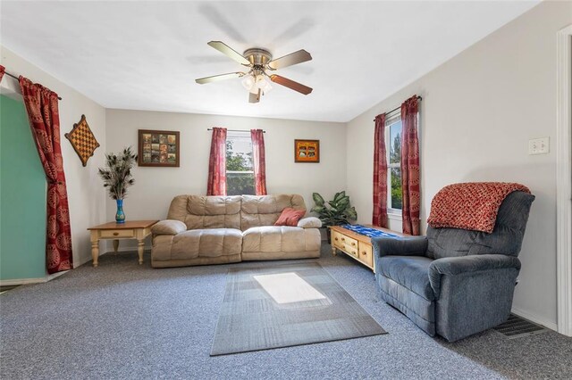 5611 State Route 156, Waterloo, IL 62298 - living room featuring carpet, ceiling fan, and baseboards