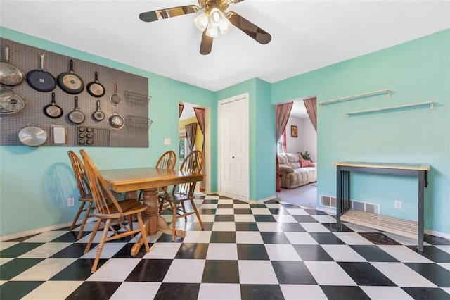 5611 State Route 156, Waterloo, IL 62298 - dining space featuring tile patterned floors, baseboards, and ceiling fan