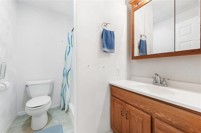 5611 State Route 156, Waterloo, IL 62298 - full bathroom featuring toilet, a shower with shower curtain, vanity, and baseboards
