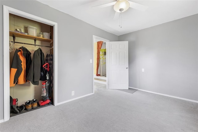 5611 State Route 156, Waterloo, IL 62298 - unfurnished bedroom featuring carpet, baseboards, a closet, and a ceiling fan