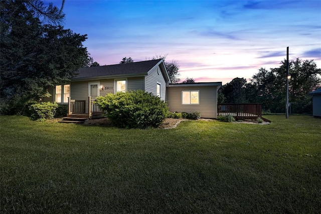 5611 State Route 156, Waterloo, IL 62298 - view of front facade with a lawn and a wooden deck