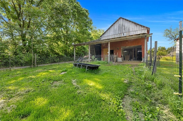 5611 State Route 156, Waterloo, IL 62298 - rear view of house with an outdoor structure and an exterior structure