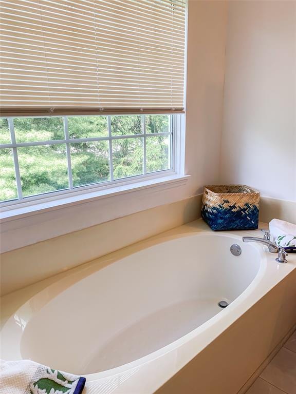 full bathroom featuring a garden tub