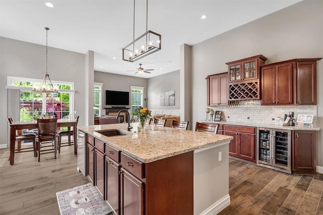 40 Burnside Ct, Frontier Township, MO 63303 - kitchen featuring wine cooler, a chandelier, a sink, wood finished floors, and recessed lighting