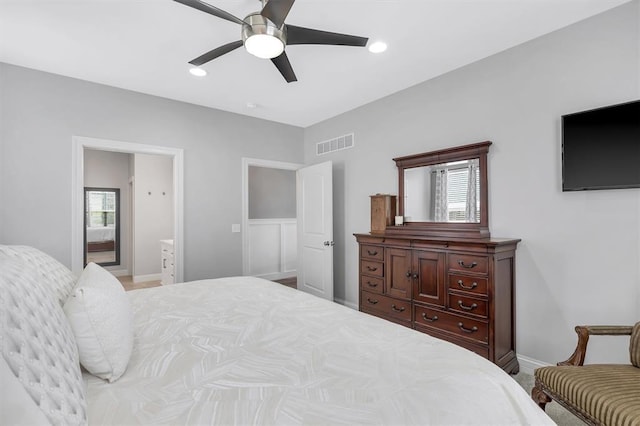 40 Burnside Ct, Frontier Township, MO 63303 - bedroom featuring multiple windows, ceiling fan, baseboards, and connected bathroom