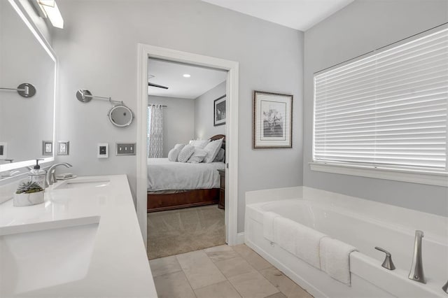 40 Burnside Ct, Frontier Township, MO 63303 - full bathroom featuring a garden tub, double vanity, and connected bathroom