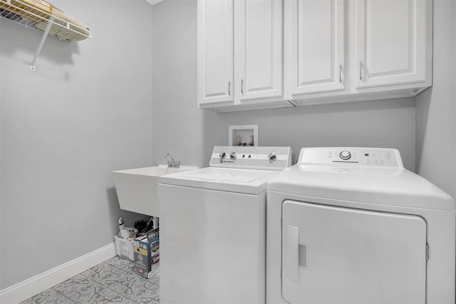40 Burnside Ct, Frontier Township, MO 63303 - washroom with independent washer and dryer, baseboards, cabinet space, and light tile patterned floors