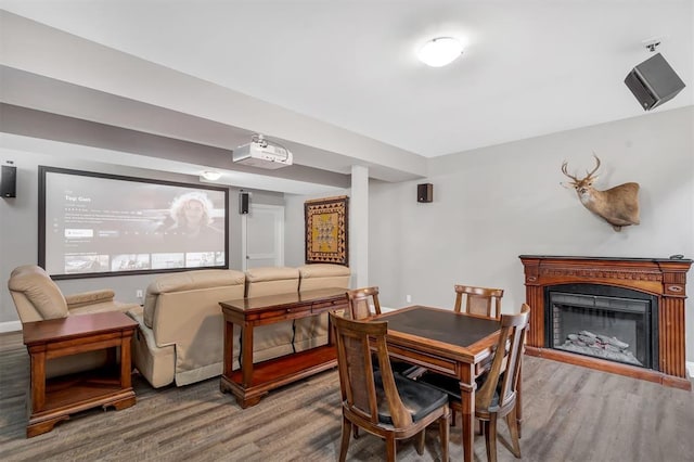 40 Burnside Ct, Frontier Township, MO 63303 - dining space featuring wood finished floors, a fireplace, and baseboards