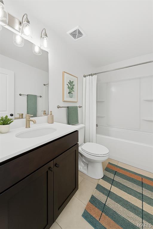 203 Homestretch Ln, Wentzville, MO 63385 - full bathroom featuring vanity, tile patterned floors, and shower / bathtub combination with curtain
