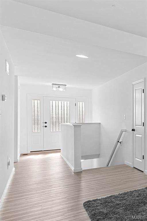 203 Homestretch Ln, Wentzville, MO 63385 - entryway with light wood-type flooring