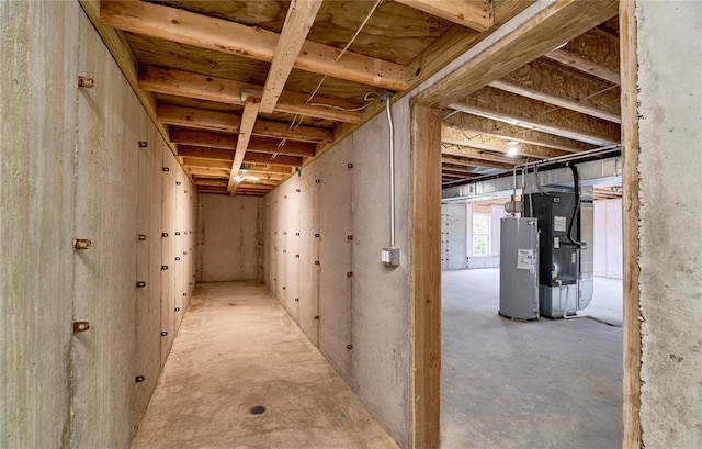 below grade area with water heater and heating unit