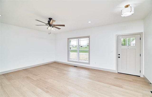 entrance foyer with light wood-style floors, ceiling fan, recessed lighting, and baseboards