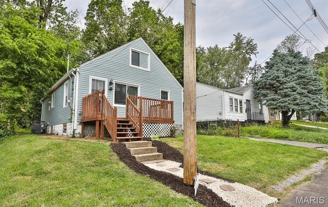 5333 Helen Ave, Jennings, MO 63136 - view of front of home with central AC unit, a deck, a front yard, and stairs