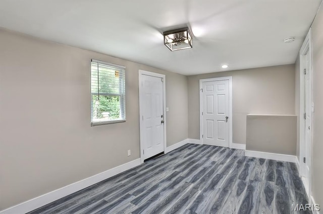 5333 Helen Ave, Jennings, MO 63136 - foyer entrance featuring baseboards, dark wood-style floors, and recessed lighting