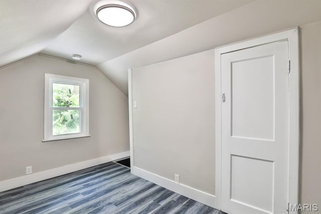 5333 Helen Ave, Jennings, MO 63136 - bonus room featuring dark wood-style flooring, lofted ceiling, and baseboards