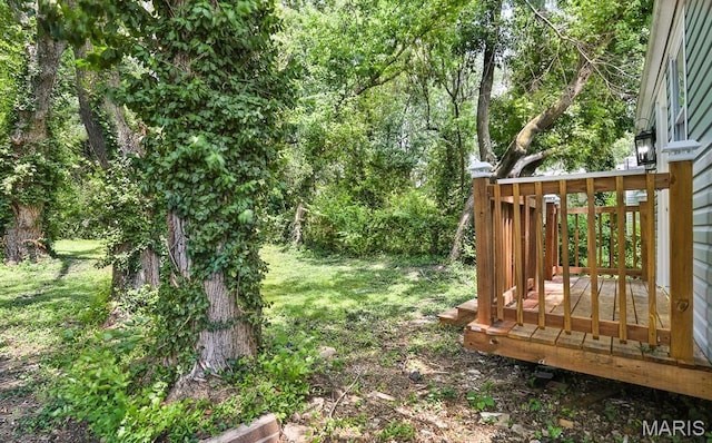 5333 Helen Ave, Jennings, MO 63136 - view of green lawn with a wooden deck