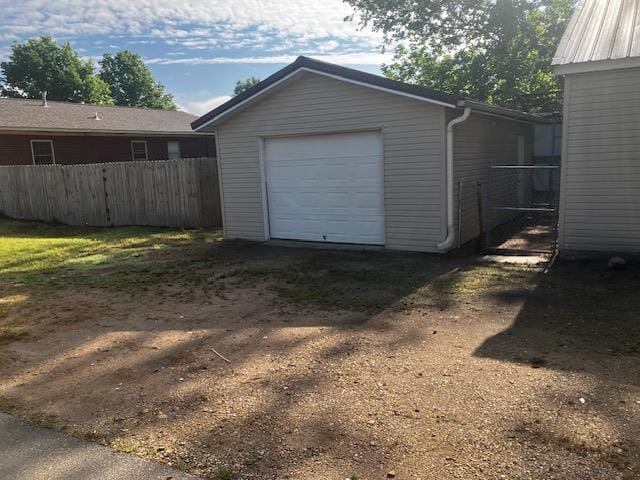 423 W Mckinley Ave, Bernie, MO 63822 - detached garage with fence and dirt driveway