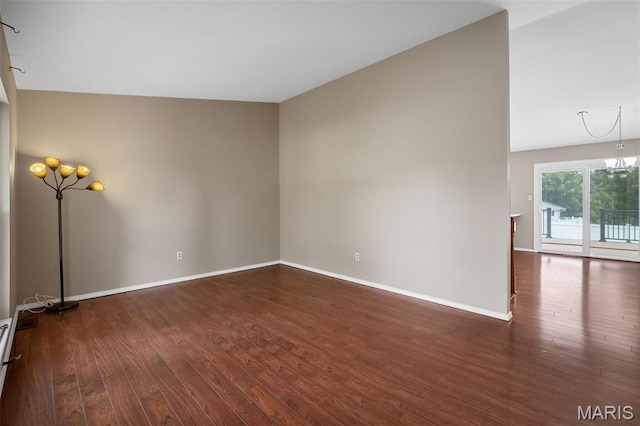 104 Maywood Ct, Saint Peters, MO 63376 - unfurnished room with dark wood finished floors and a chandelier