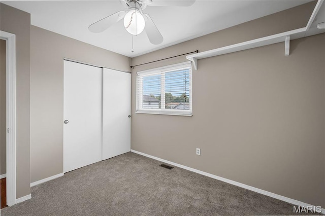 104 Maywood Ct, Saint Peters, MO 63376 - unfurnished bedroom featuring carpet, a closet, and a ceiling fan