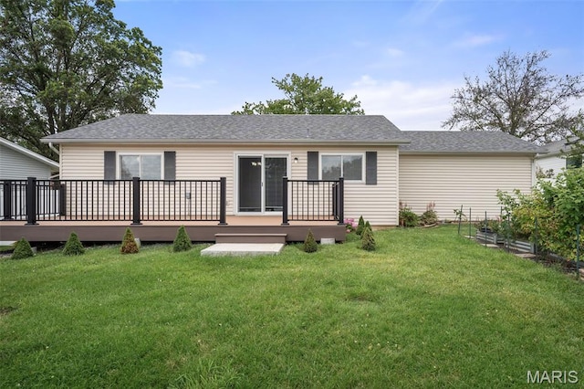 104 Maywood Ct, Saint Peters, MO 63376 - rear view of property featuring a wooden deck, a vegetable garden, a yard, and roof with shingles
