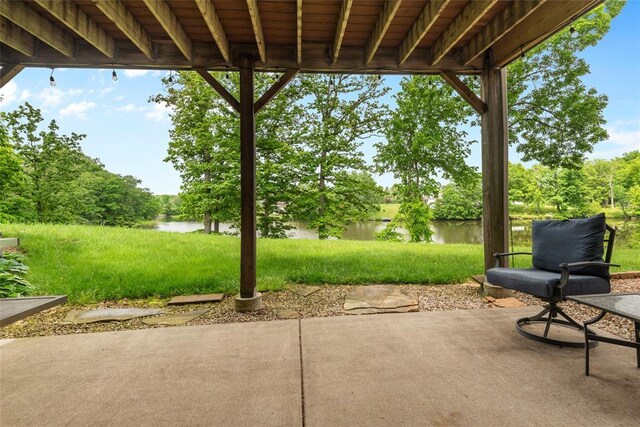 view of patio / terrace with a water view