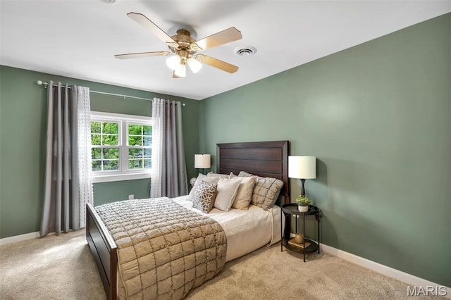 7439 Wellington Ave, University City, MO 63130 - bedroom featuring carpet and a ceiling fan