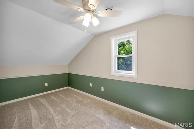 7439 Wellington Ave, University City, MO 63130 - additional living space featuring lofted ceiling, ceiling fan, and carpet flooring
