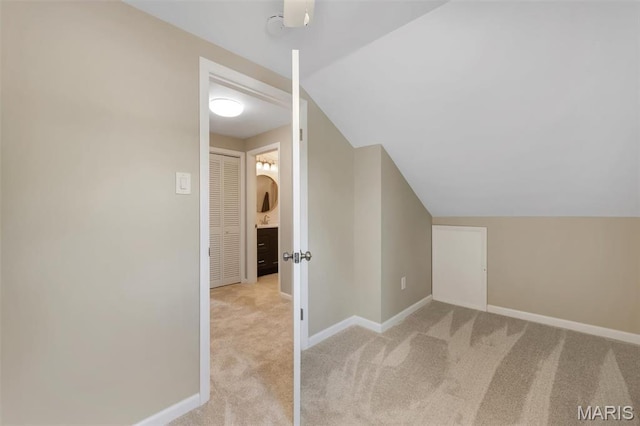 7439 Wellington Ave, University City, MO 63130 - additional living space with carpet and lofted ceiling