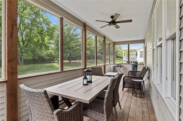 2056 Hawks Landing Dr, Lake St Louis, MO 63367 - sunroom / solarium featuring ceiling fan and outdoor dining area