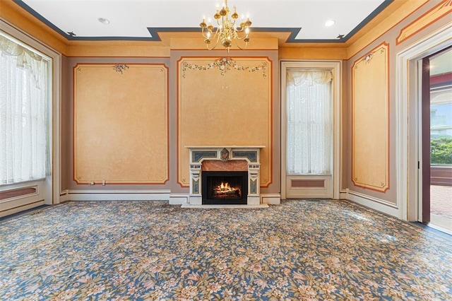 3534 Washington Ave, Saint Louis, MO 63103 - unfurnished living room featuring a chandelier, a fireplace, carpet, and ornamental molding