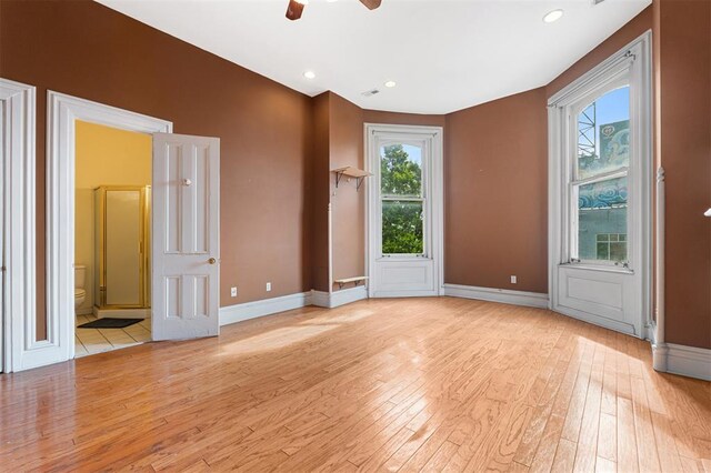 3534 Washington Ave, Saint Louis, MO 63103 - empty room with light wood-style floors, baseboards, ceiling fan, and recessed lighting