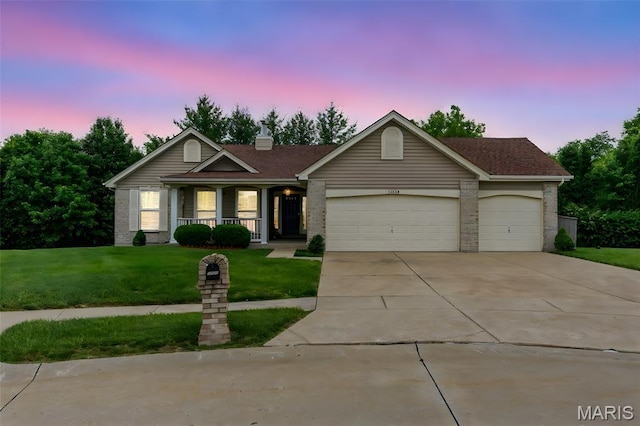 13116 Ambrose Ct, Black Jack, MO 63033 - ranch-style house featuring a porch, a yard, an attached garage, concrete driveway, and brick siding