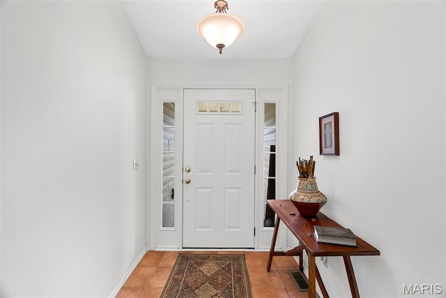 13116 Ambrose Ct, Black Jack, MO 63033 - entrance foyer with light tile patterned floors and baseboards