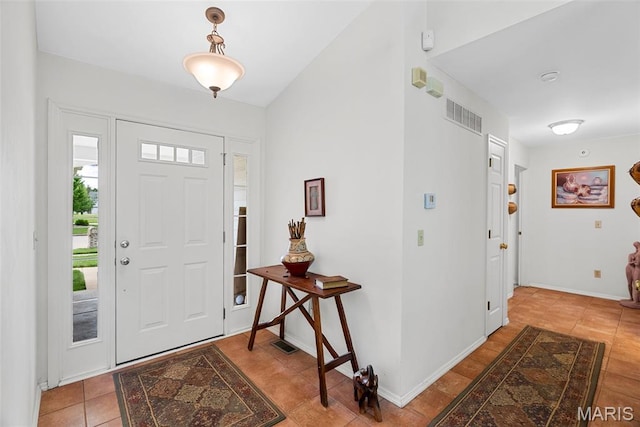 13116 Ambrose Ct, Black Jack, MO 63033 - foyer with tile patterned floors and baseboards