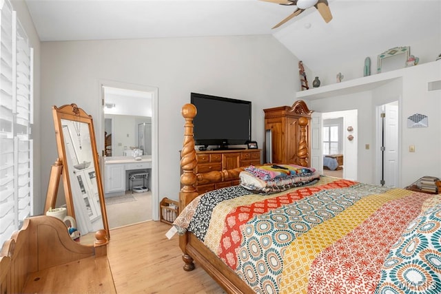 13116 Ambrose Ct, Black Jack, MO 63033 - bedroom featuring light wood-type flooring, vaulted ceiling, ensuite bath, and a ceiling fan