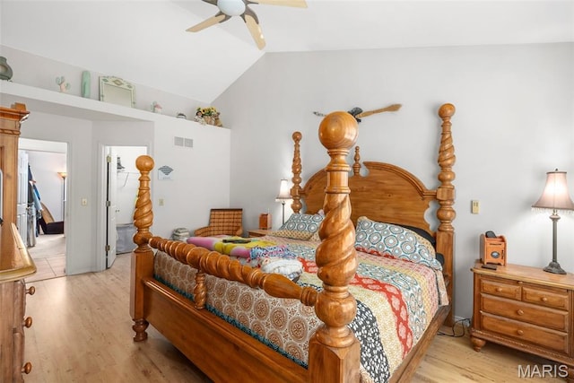 13116 Ambrose Ct, Black Jack, MO 63033 - bedroom featuring light wood finished floors, vaulted ceiling, and ceiling fan