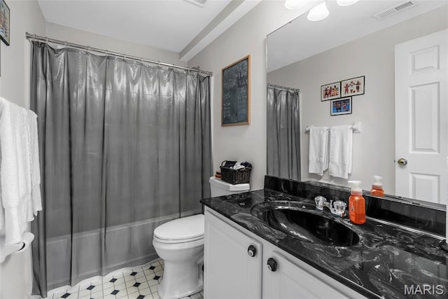 13116 Ambrose Ct, Black Jack, MO 63033 - full bathroom with vanity, shower / tub combo, toilet, and tile patterned floors