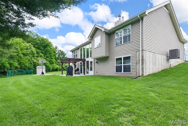 13116 Ambrose Ct, Black Jack, MO 63033 - rear view of property featuring a pergola, a yard, a patio area, and a chimney