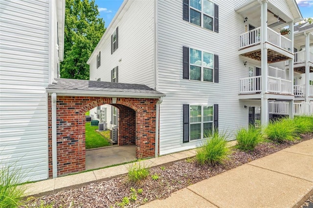 1408 Summertree Springs Ave Unit C, Valley Park, MO 63088 - view of side of home featuring brick siding and roof with shingles