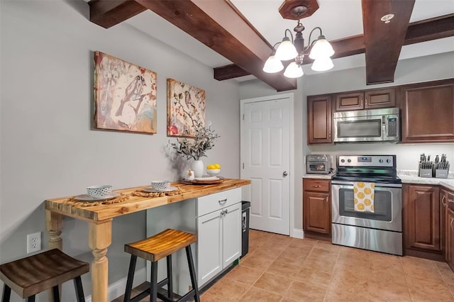 1408 Summertree Springs Ave Unit C, Valley Park, MO 63088 - kitchen featuring appliances with stainless steel finishes, beamed ceiling, a chandelier, wooden counters, and light tile patterned floors