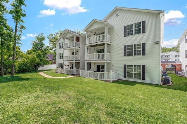 1408 Summertree Springs Ave Unit C, Valley Park, MO 63088 - back of property with central air condition unit and a lawn