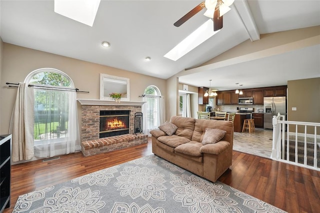 14 Heavenly Valley Dr, Dardenne Prairie, MO 63368 - living room featuring a skylight, wood finished floors, healthy amount of natural light, and recessed lighting