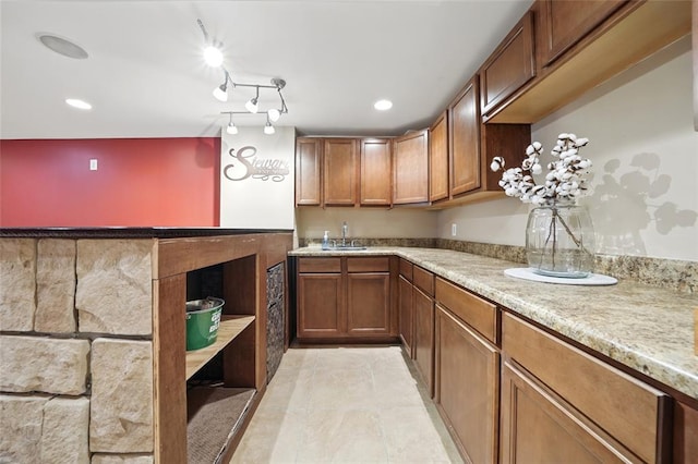 14 Heavenly Valley Dr, Dardenne Prairie, MO 63368 - kitchen with a sink, brown cabinetry, light tile patterned floors, and open shelves