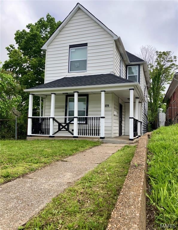 5379 Wabada Ave, Saint Louis, MO 63112 - view of front of house with a porch and a shingled roof